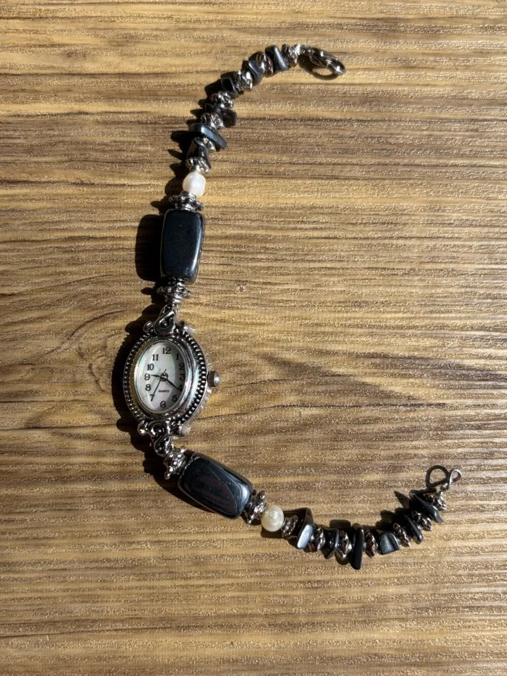 vintage geneva black and silver beaded with mother of pearl face watch OS